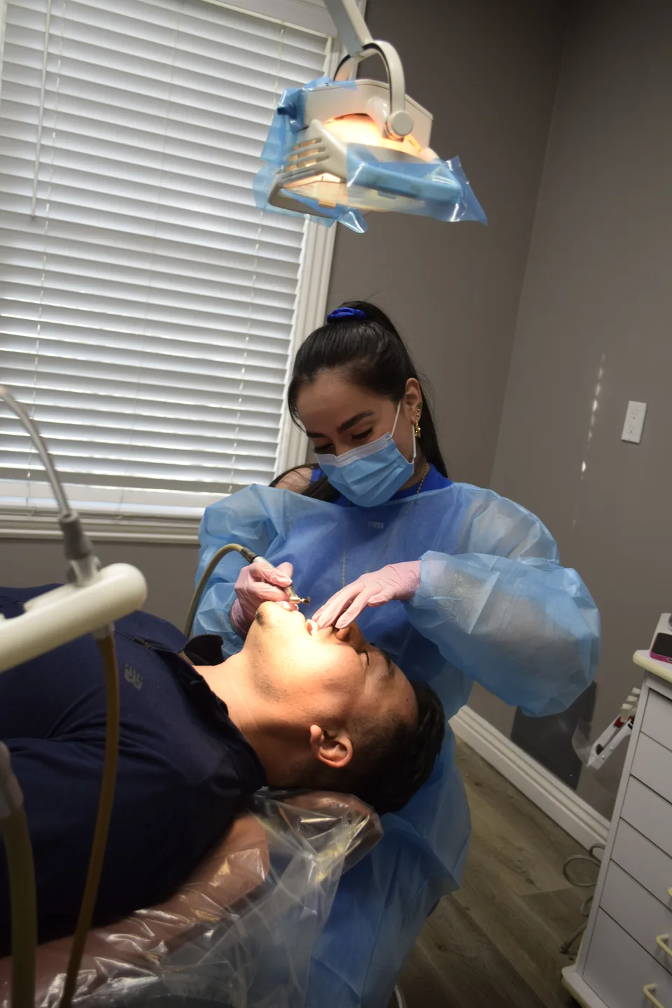 Dental care for a patient at the Latino Americano Dental office